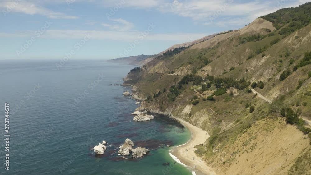 California Coast meets Pacific Ocean, Birds Eye Aerial View California Coast meets Pacific Ocean, Birds Eye Aerial View
