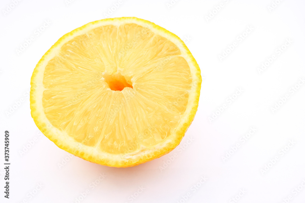 Lemon fruit cut in half in close-up. Food for vegetarian or vegan. Frame for text.
