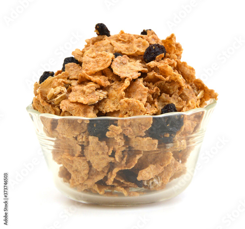 bran and raisin cereal in a bowl , top view