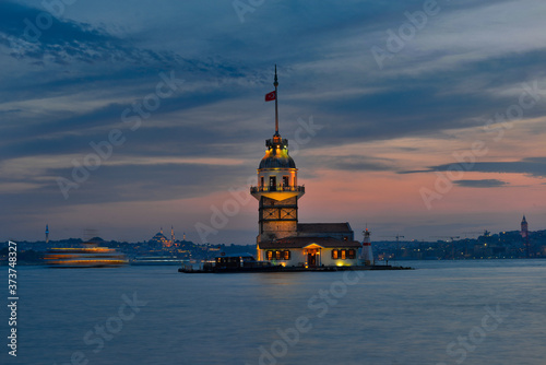 Maiden's Tower or Kiz Kulesi at night with motion blur boats - Istanbul, Turkey. © Orhan Çam