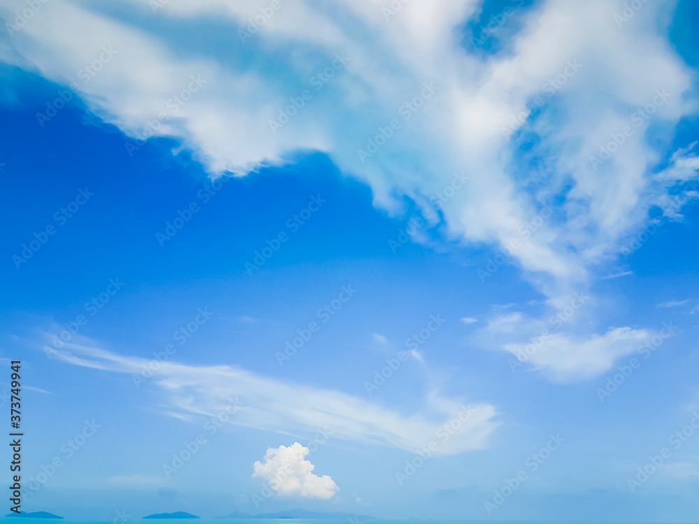 Blue sky with white cloud, scenic tropical seascape.