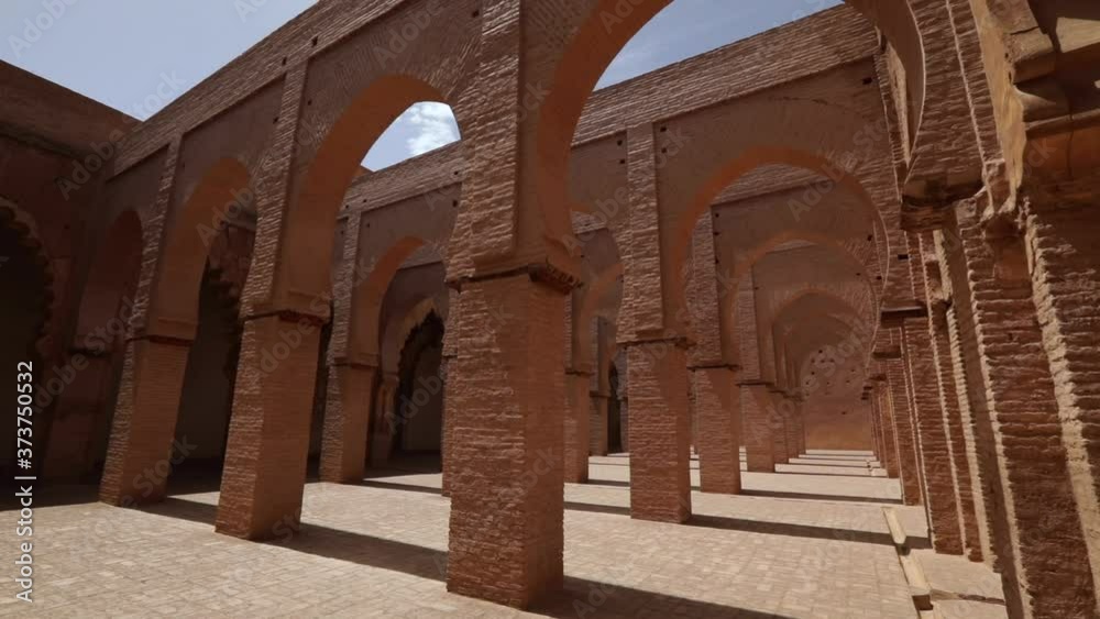 The Tin Mel Mosque is a mosque located in the High Atlas mountains of North Africa built in 1156 to commemorate the founder of the Almohad dynasty Mohamed Ibn Tumart The Tin Mel Mosque is a mosque located in the High Atlas mountains of North Africa built in 1156 to commemorate the founder of the Almohad dynasty Mohamed Ibn Tumart