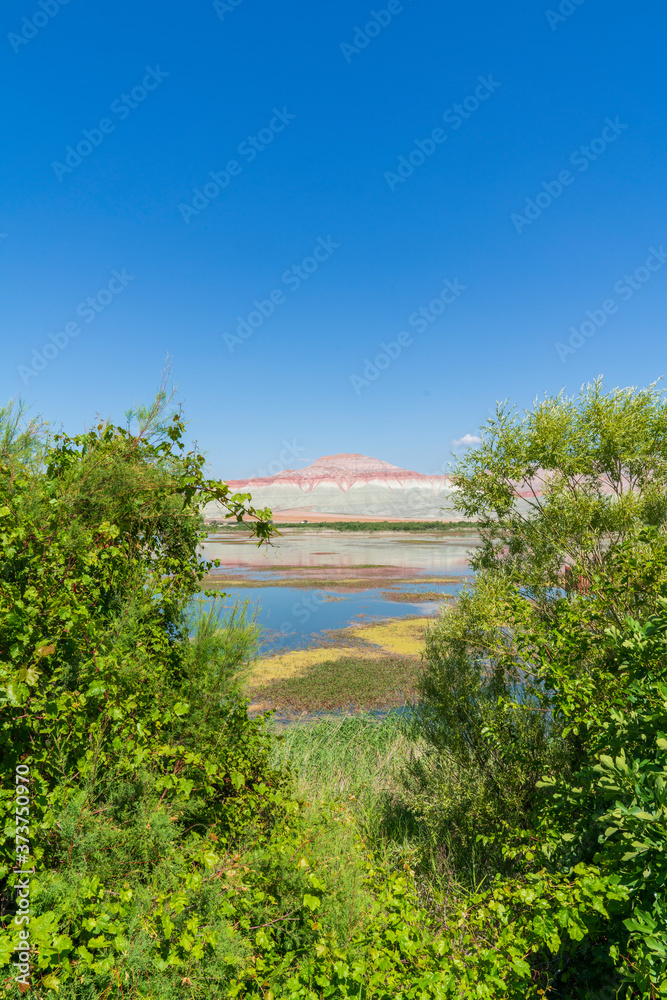 Nallihan Natural Park Ankara Turkey. Colorful geological layers of mountain reflection on the lake