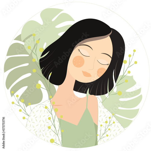 Portrait of young woman in plants and herbs