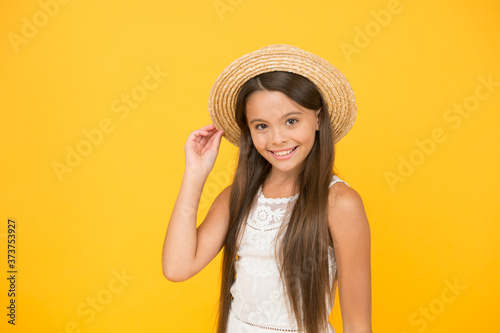 What a great day. beauty style of hot season. summer weather forecast. vacation time. small girl wear straw beach hat. fashion and beauty. childhood happiness. happy childrens day