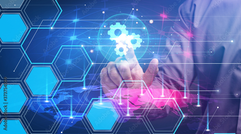 Business, Technology, Internet and network concept. Young businessman working on a virtual screen of the future and sees the inscription: Business, Technology, Internet and network concept. Young businessman working on a virtual screen of the future and sees the inscription: