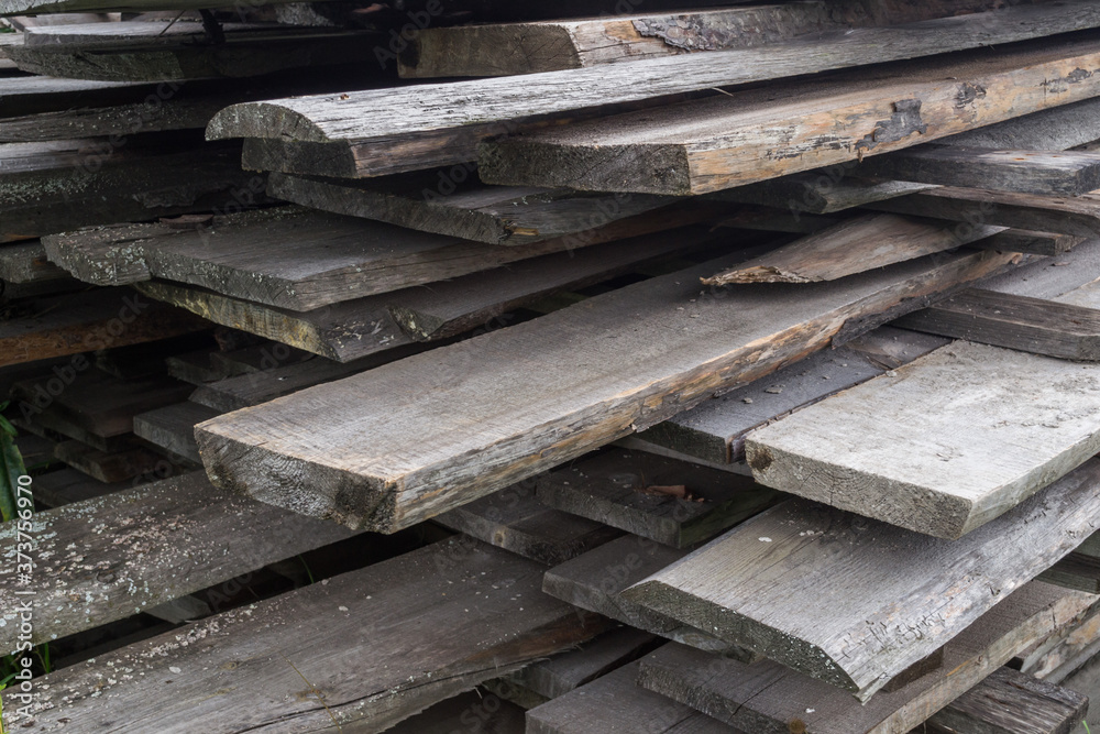 Wooden boards are stored on the street Wooden boards are stored on the street
