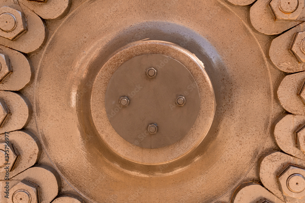 Iron engineered construction with large hex bolts and nuts Iron engineered construction with large hex bolts and nuts