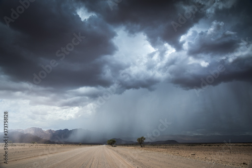 Rain Storm Over The Namib Desert photo