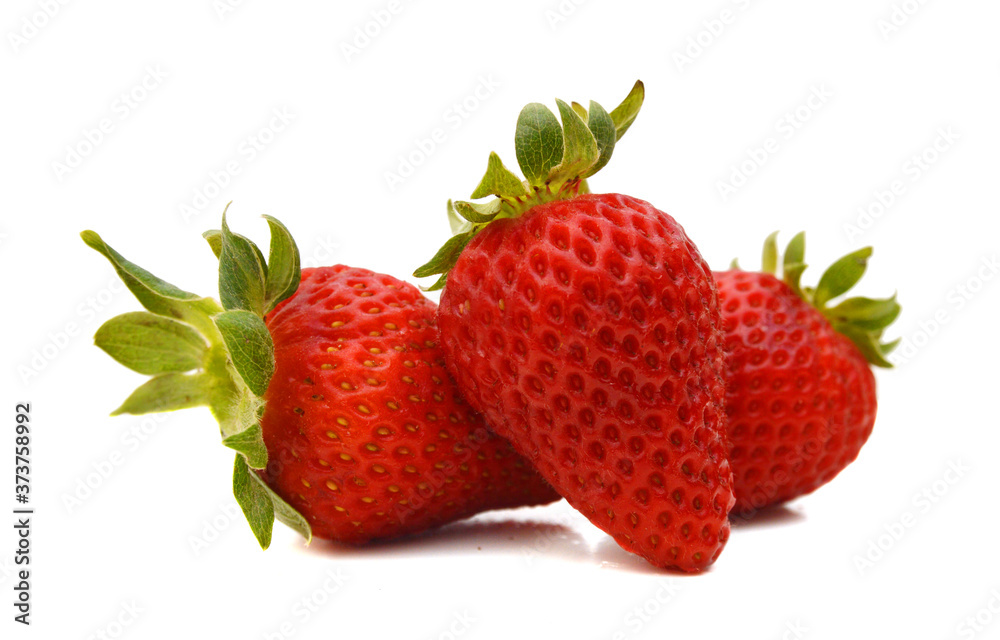 Three strawberry isolated on a white background, macro image Three strawberry isolated on a white background, macro image