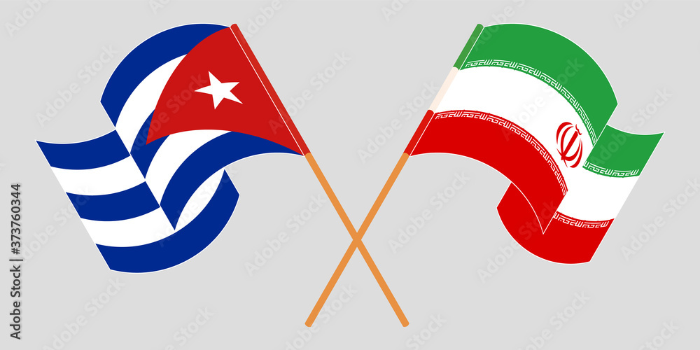 Crossed and waving flags of Iran and Cuba