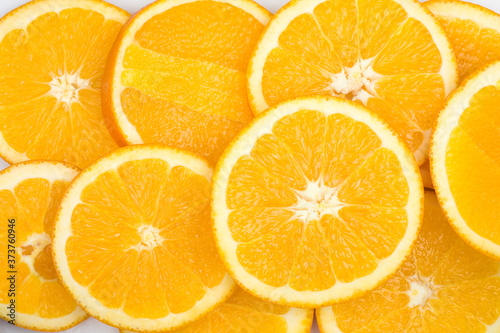 Sliced oranges isolated on white background, top view