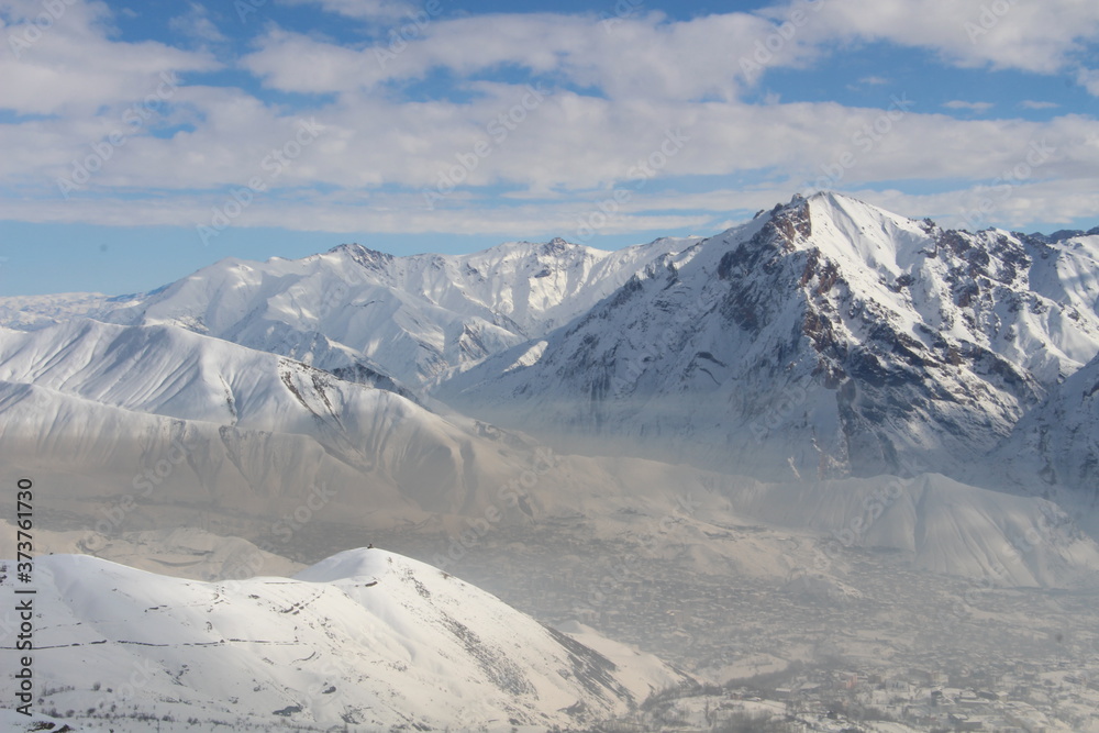 snow covered mountains in winter snow covered mountains in winter