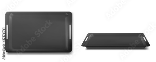 Empty black food tray for lunch in restaurant or canteen. Vector realistic mockup of blank rectangle plastic salver with handles front and top view isolated on white background