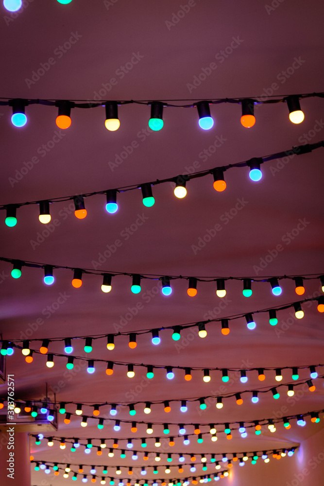 Colorful garland on the ceiling