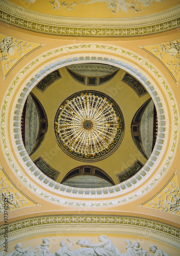 Ceiling with yellow chandelier