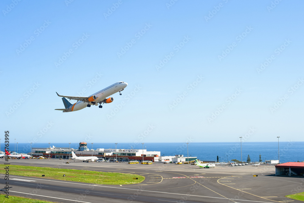 Airplane taking off airport Madeira