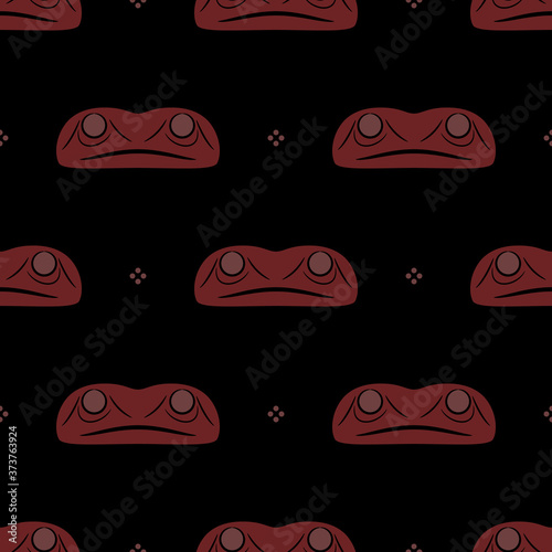 Seamless ethnic pattern with Native American motifs of Haida Indians. Stylized face of frog totem.