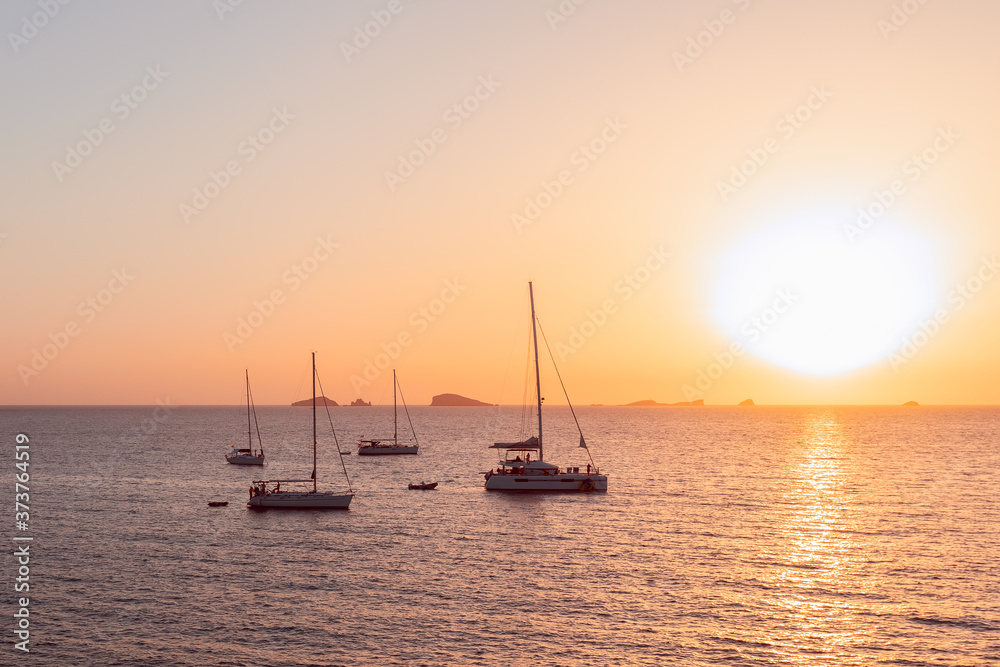 Beautiful sunset on the island of Ibiza. View from Cala Escondida (Cala Comte). Balearic Islands. Spain