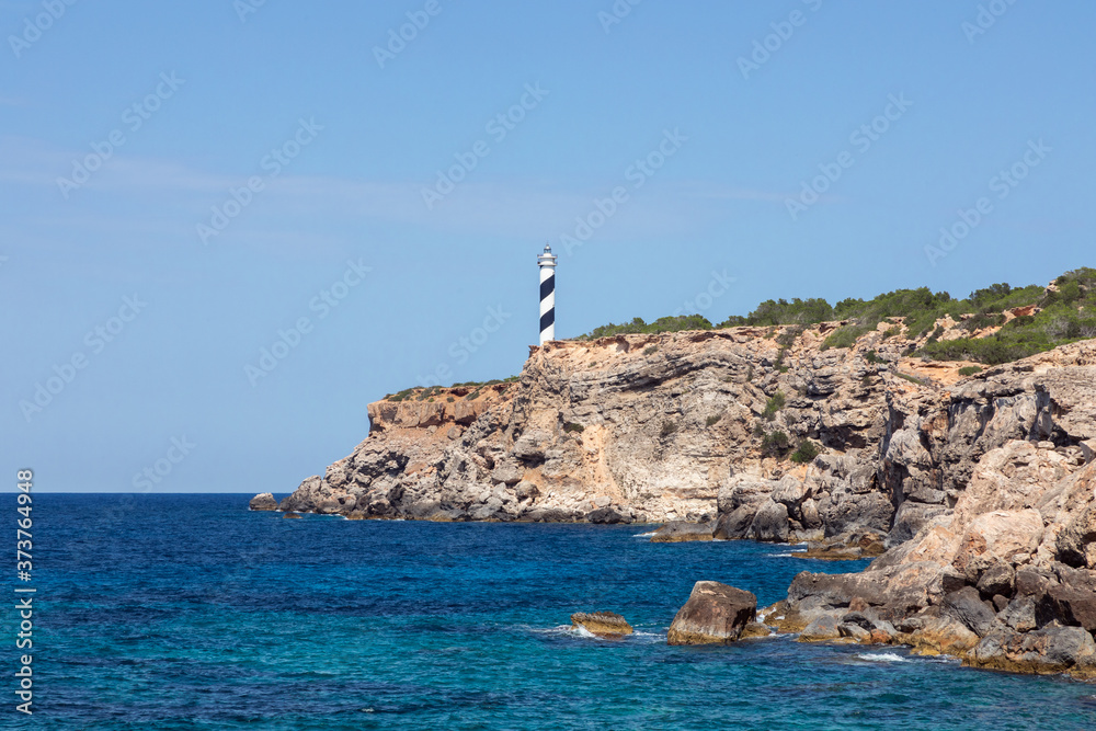 Beautiful view of the lighthouse Moscarter. Ibiza, Balearic Islands, Spain