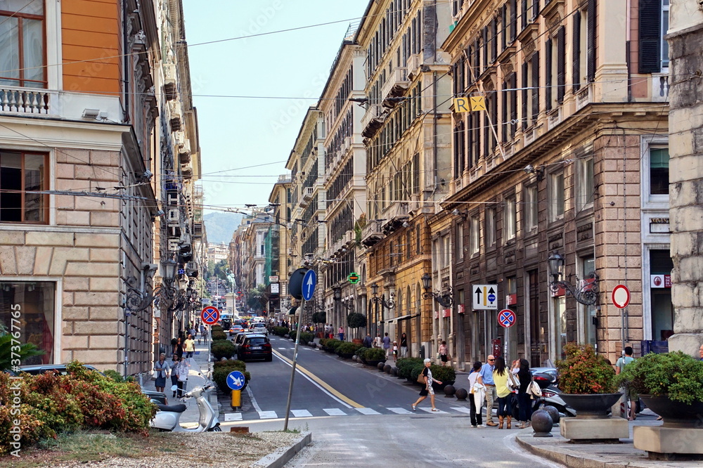 Obraz premium View of old buildings and street in Genoa, region of Liguria, Italy