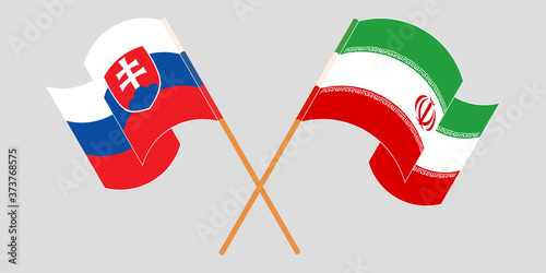 Photography Crossed and waving flags of Iran and Slovakia