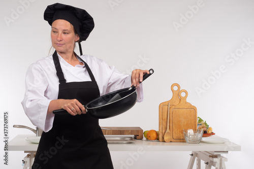 Female chef. Chef with a fr...