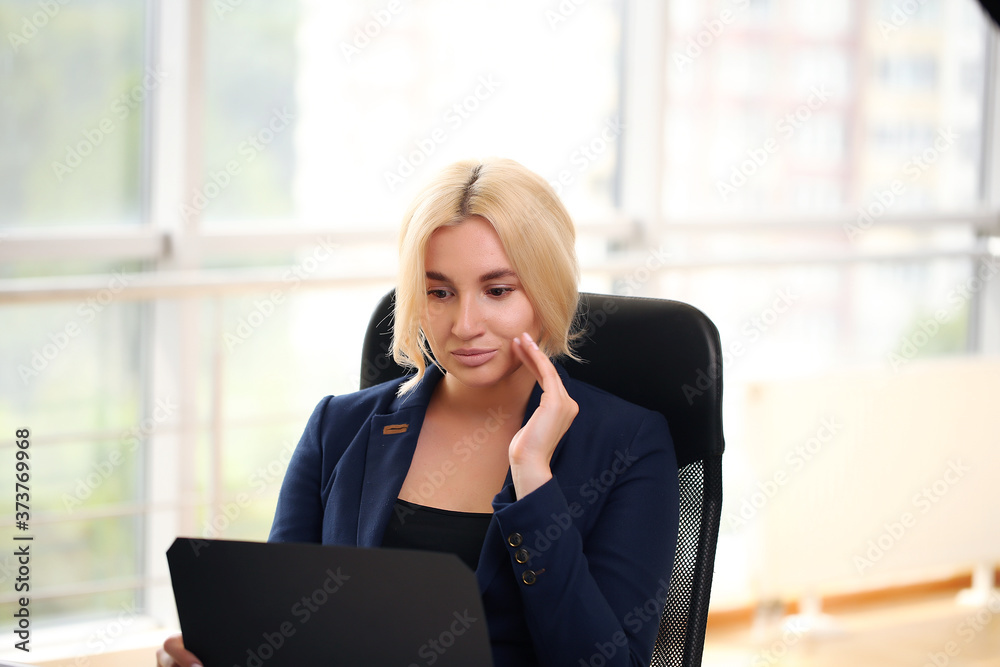 Successful businessman smiling while holding a folder with sales charts. business woman Successful businessman smiling while holding a folder with sales charts. business woman