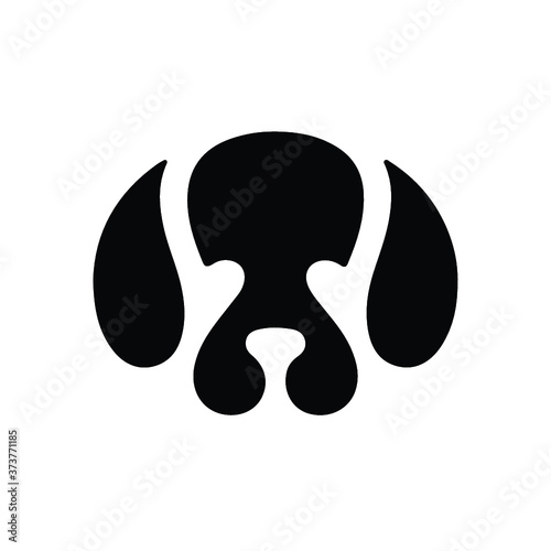 Vector black silhouette of a dog isolated on a white background.