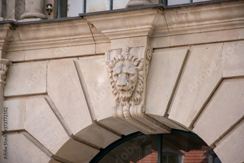 Lion head arch on a building from the city of Cottbus in Brandenburg, Germany photo