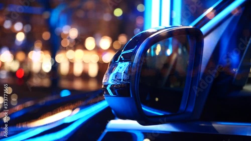 Car side mirror at night photo