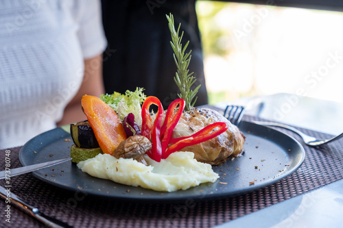 Woman eating in restaurant presentation great food delicious photo