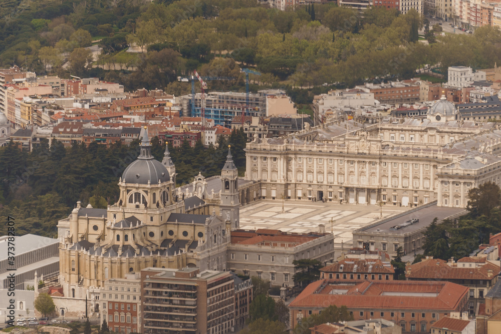 Aerial view of Royal Palace and Almudena Cathedral in Madrid. Travel, tourism, famous place.