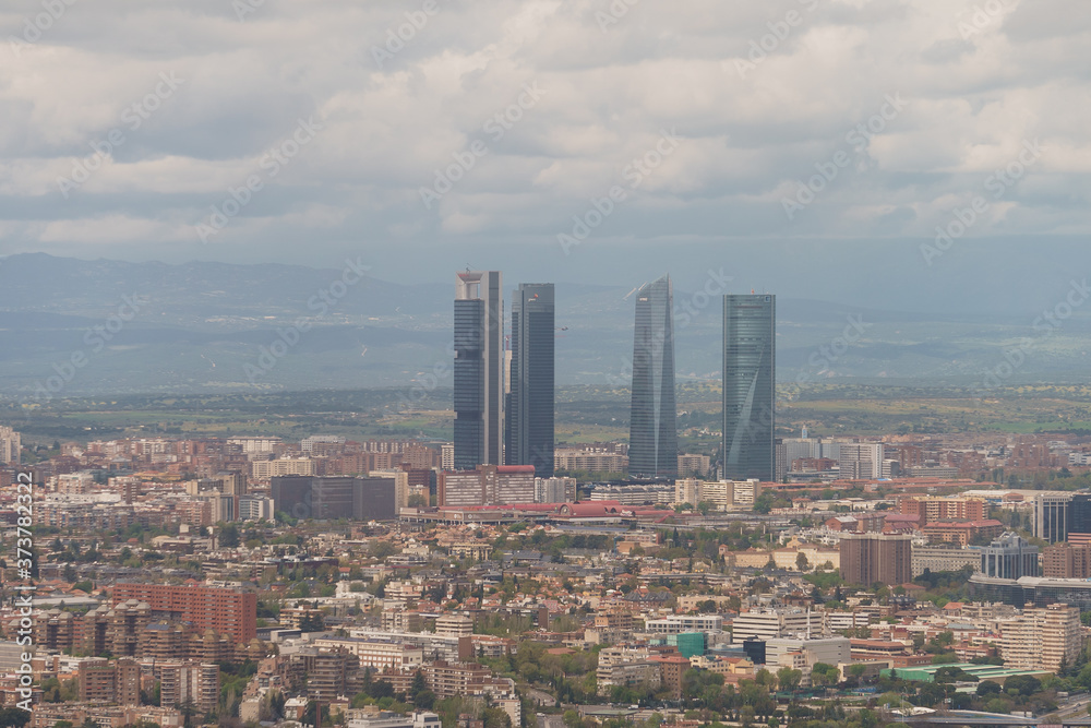 Madrid, Spain financial district skyline in a cloudy day. Buildings, Landmarks, Business, Finance.