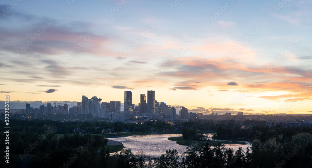 Colorful sunset with north american city downtown skyline, shot in Calgary, Alberta, Canada