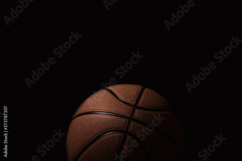Closeup detail of basketball ball texture background. Team sport concept.  Sports modern banner © Augustas Cetkauskas