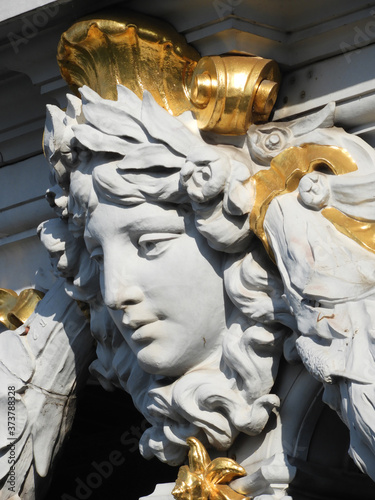 Fototapeta Naklejka Na Ścianę i Meble -  Woman face detail on Alexander III bridge over the Seine in Paris