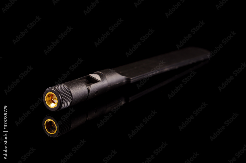 Monopole antenna for IoT and 5G isolated on the black background Monopole antenna for IoT and 5G isolated on the black background