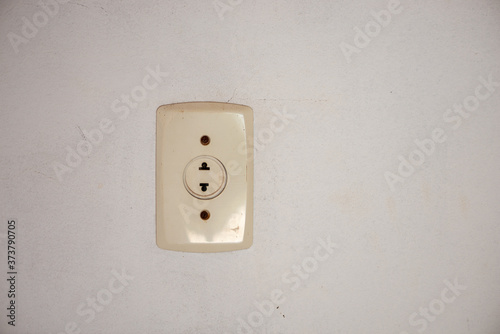 Old not branded dirty wall plug