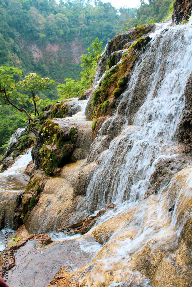 waterfall in the mountains waterfall in the mountains