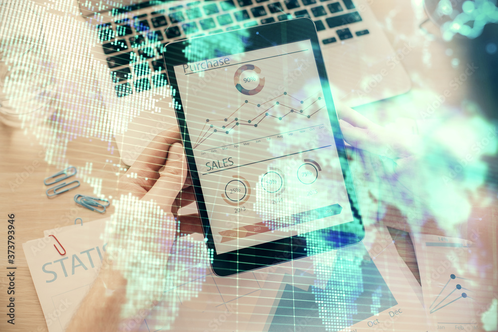 Double exposure of man's hands holding and using a phone and international business theme drawing. Double exposure of man's hands holding and using a phone and international business theme drawing.