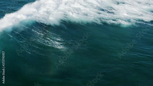 Expert Female Surfer Riding Wave