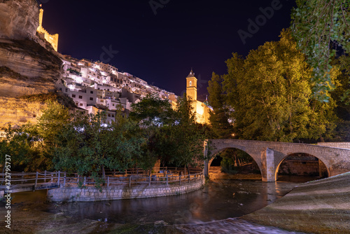 Alcala del jucar illuminated at night photo