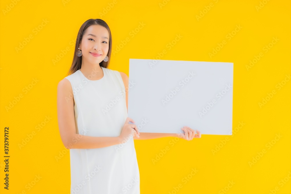 Portrait beautiful young asian woman with empty white billboard Portrait beautiful young asian woman with empty white billboard