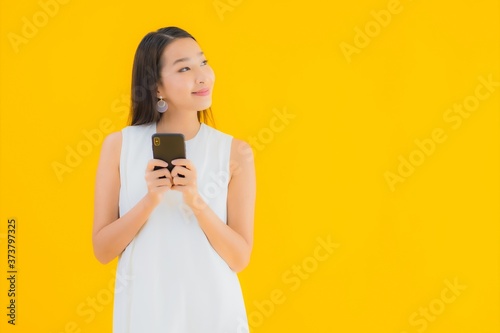 Portrait beautiful young asian woman with smart mobile phone