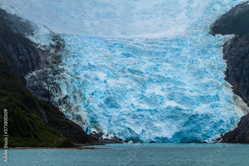 Chile, Tierra del Fuego. Glacier leading to the sea. photo