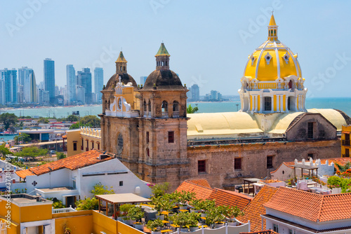 Iglesia de San Pedro Claver in the old town, high-rises of the new city in the background, Cartagena, UNESCO World Heritage Site, Bolivar Department, Colombia photo