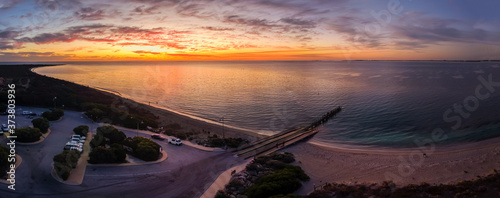 Cuadro en lienzo Arial sunset at Long Point Jetty with people fishing and swimming, Port Kennedy