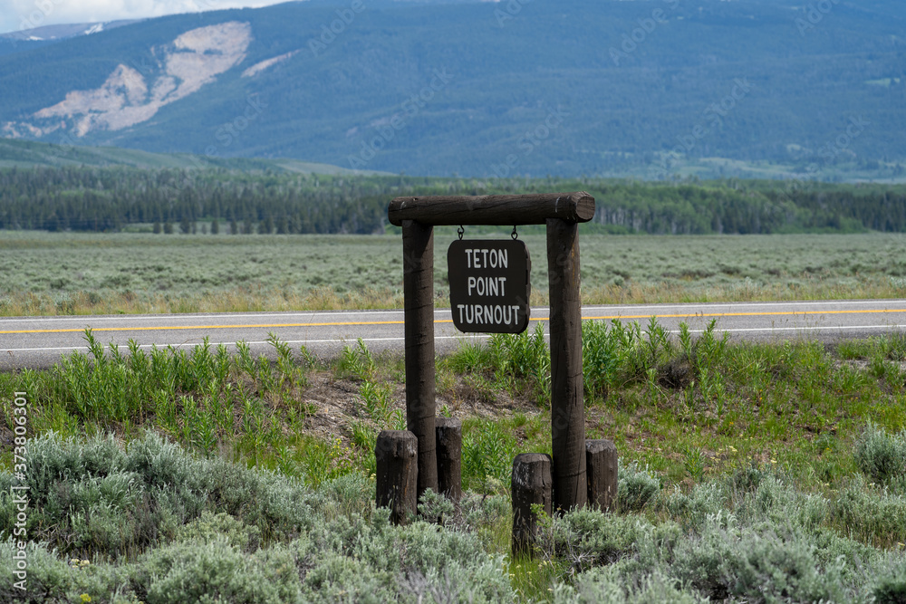 The Grand Teton National Park mountains in Wyoming - the Teton Point turnout sign