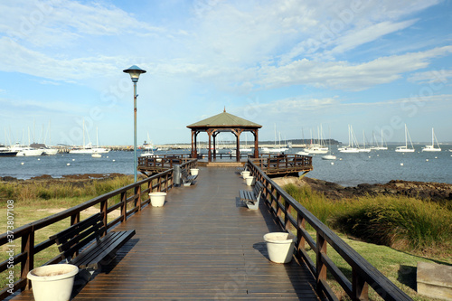 Sunny morning on the Mansa beach Pier photo